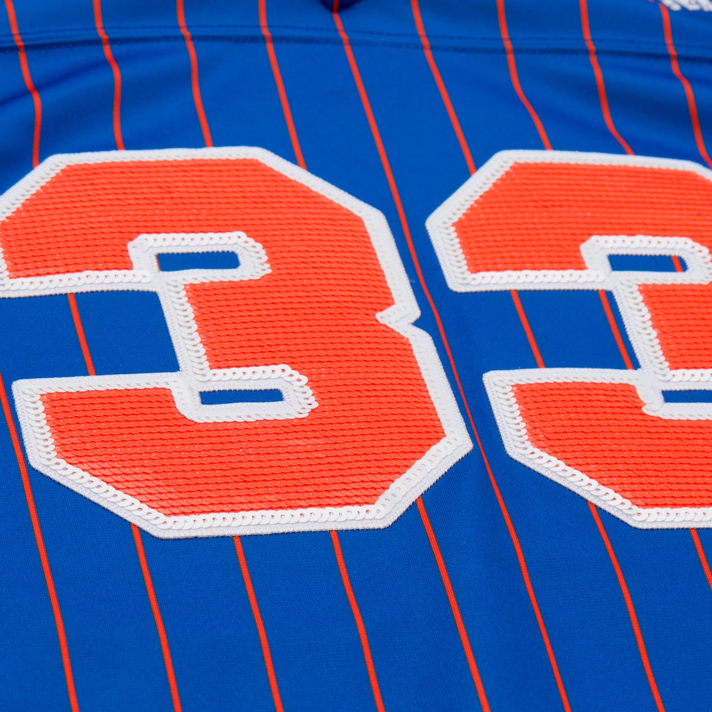 Women's New York Knicks Patrick Ewing Mitchell & Ness x DANNIJO Blue Name & Number Cropped Football Jersey